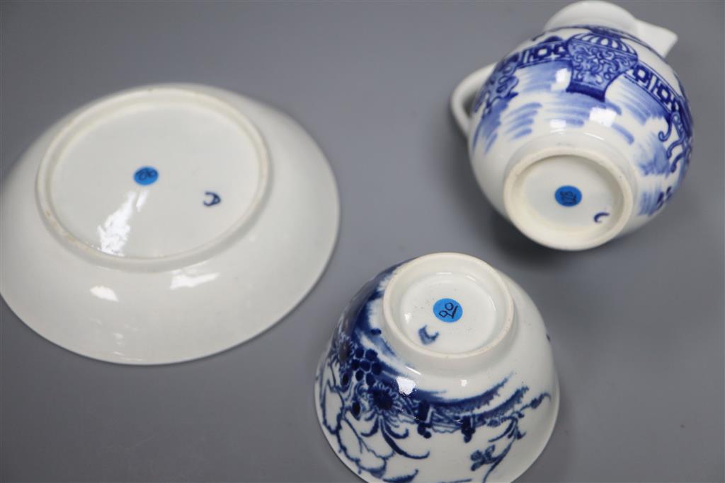 A Worcester Candle Fence tea bowl & saucer, c.1765 and a The Bat sparrow beak milk jug, c.1785,